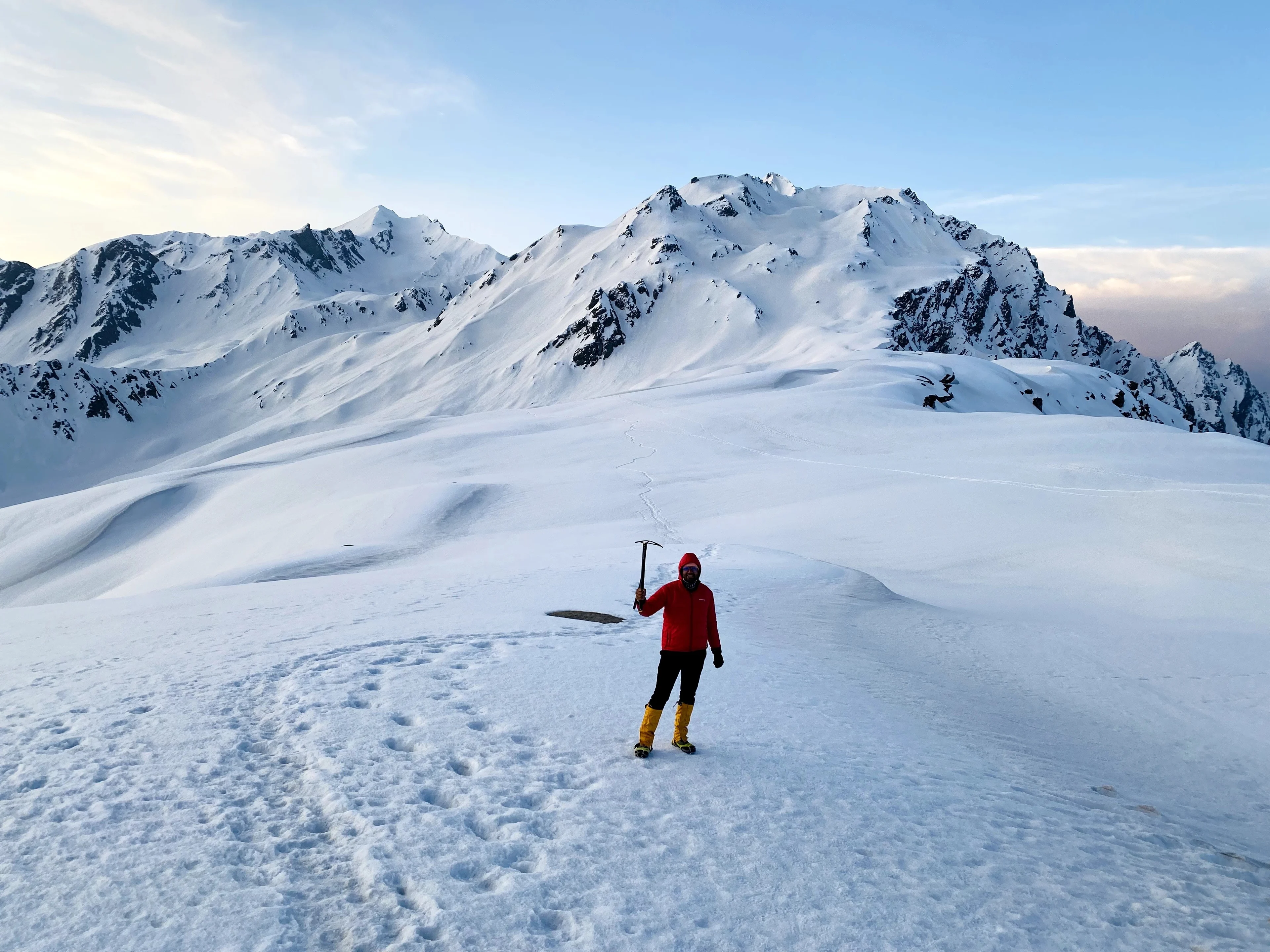 Snow-covered mountains along the Sar Pass trek